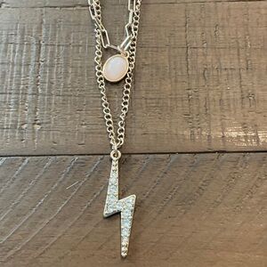 Red Sequin Clutch with Gold Lightning Bolt Bracelet